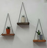 Rustic floating wall shelf with thin black rope