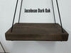 Rustic floating wall shelf with thin black rope