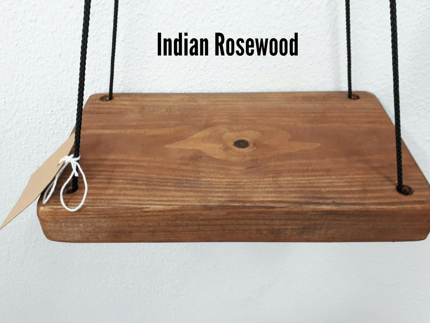 Rustic floating wall shelf with thin black rope