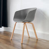 Set of 4 Plastic Dining Chairs Grey Round Accent Tub Seat Wood Effect Metal Legs