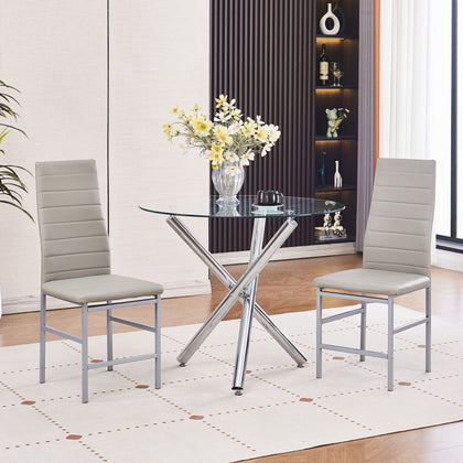 2x Grey Faux Leather Dining Chairs & Round Clear Glass Chromed Dining Table Set