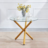 Round Clear Glass Dining Table Golden Legs & 4x Grey Faux Leather Dining Chairs