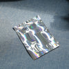 100X Holographic Foil Heat Seal Zip Lock Pouch Bag Rainbow Laser Bags NEW