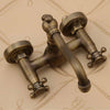 Wall Mount Antique Brass Swivel Bathroom Sink Faucet Basin Mixer Tap Dual Handle