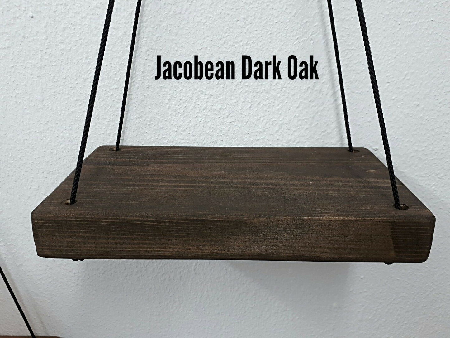 Rustic floating wall shelf with thin black rope