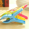 4Pcs Plastic Towel Hanging Clips Clothes Pins Beach Pegs Quilt Sunbed Socks Clip