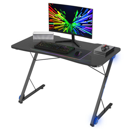 43.5” Ergonomic Gaming Desk Z-Shaped Professional Gamer Workstation LED Lights