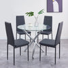 Round Tempered Glass Dining Table 4x Black Faux Leather Dining Chairs Diningroom